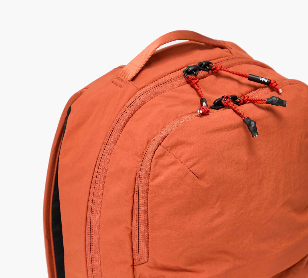Pakt-Stash-Packable-Backpack-16L#color_sumac